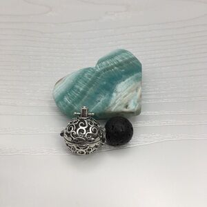 Swirl Pattern Aromatherapy Silver tone Locket.  Lava stone included.